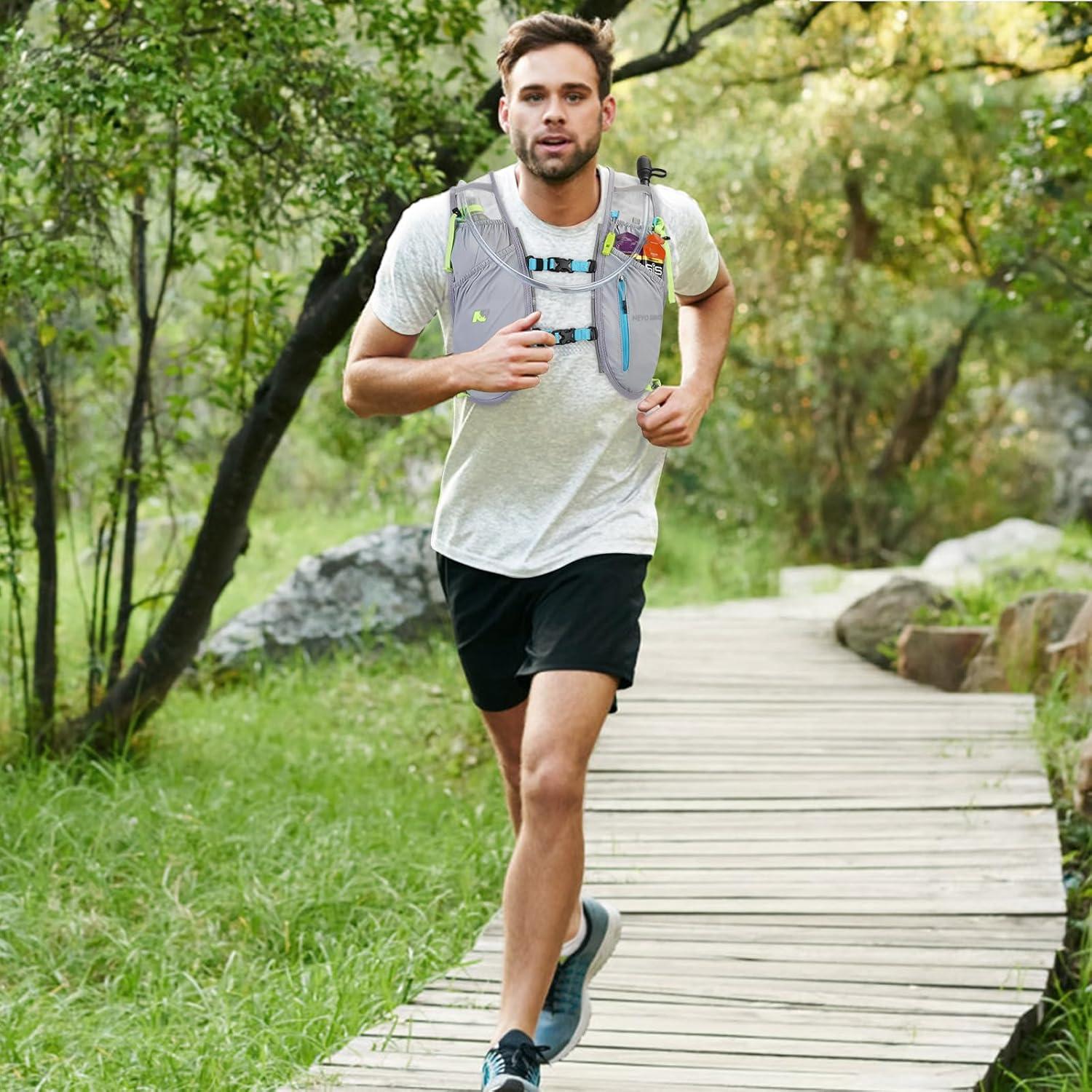 imageWaterproof Running Vest 55L Breathable Running Hydration Vest with 15L Water Bladder Water Vest for Hiking Trail Marathon Race Ideal for Women and MenLight Gray